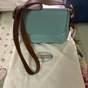 Fossil crossbody in sky blue.